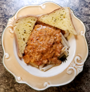 Pasta Bolognese with Garlic Toast